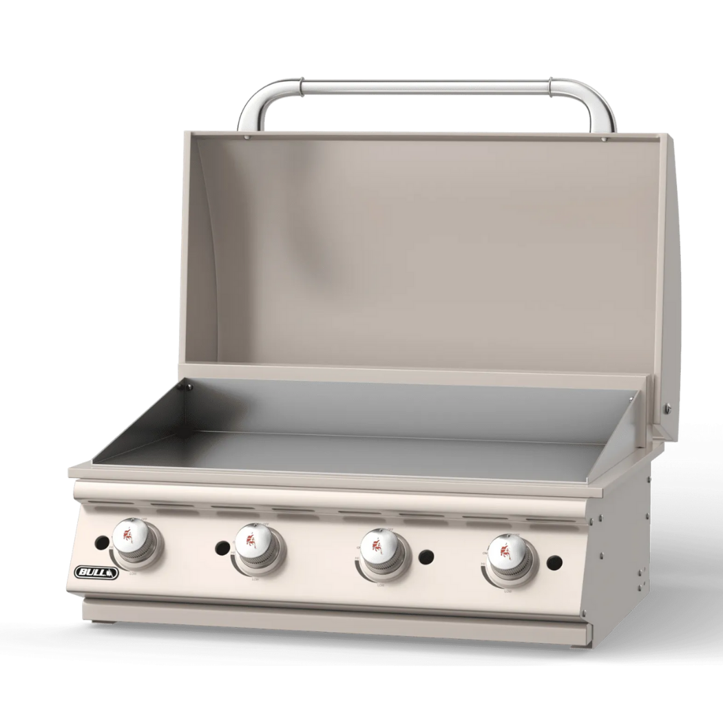 Stainless steel grill with four control knobs on a white background