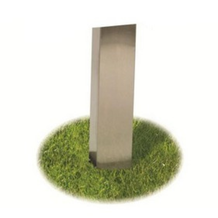 Metallic sculpture on a grassy patch with a white background